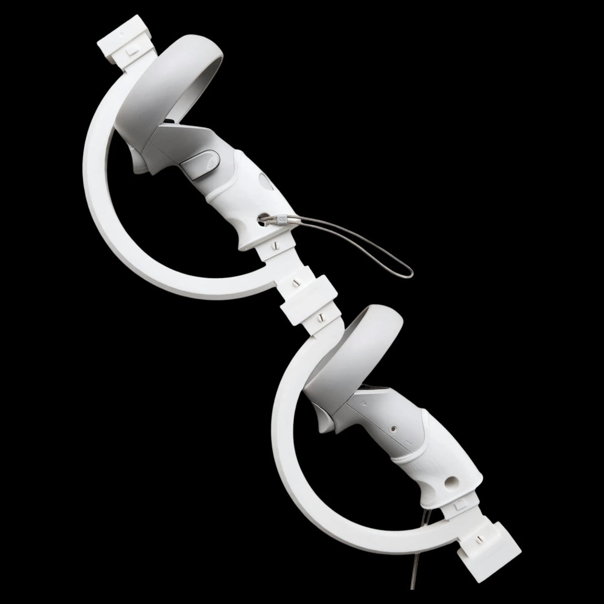 Two ARC Sword attachment grips connected by a curved bridge, side view